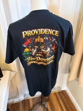 Black Graphic Tee with White Crest Logo